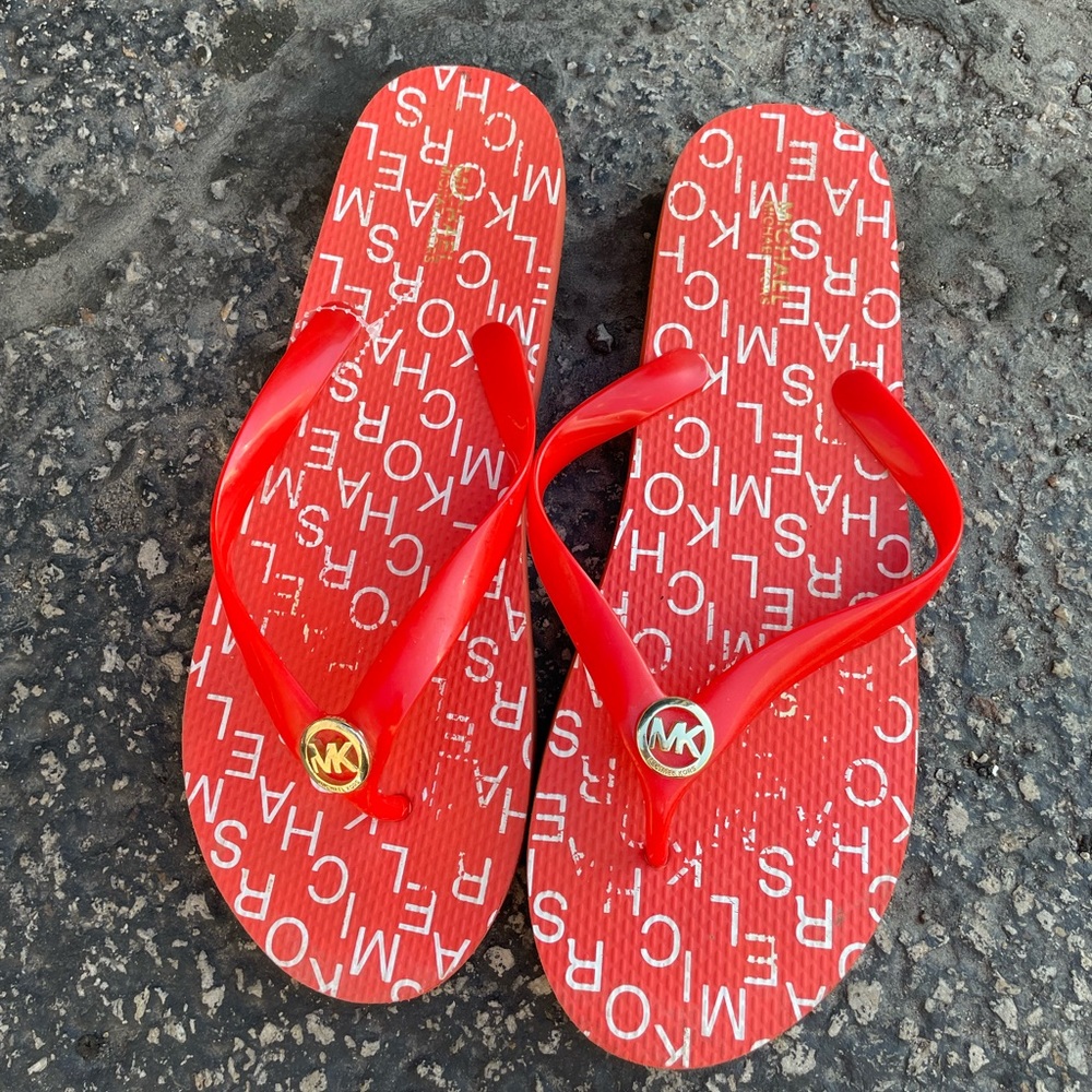 Michael Kors red flip flops size 10 M